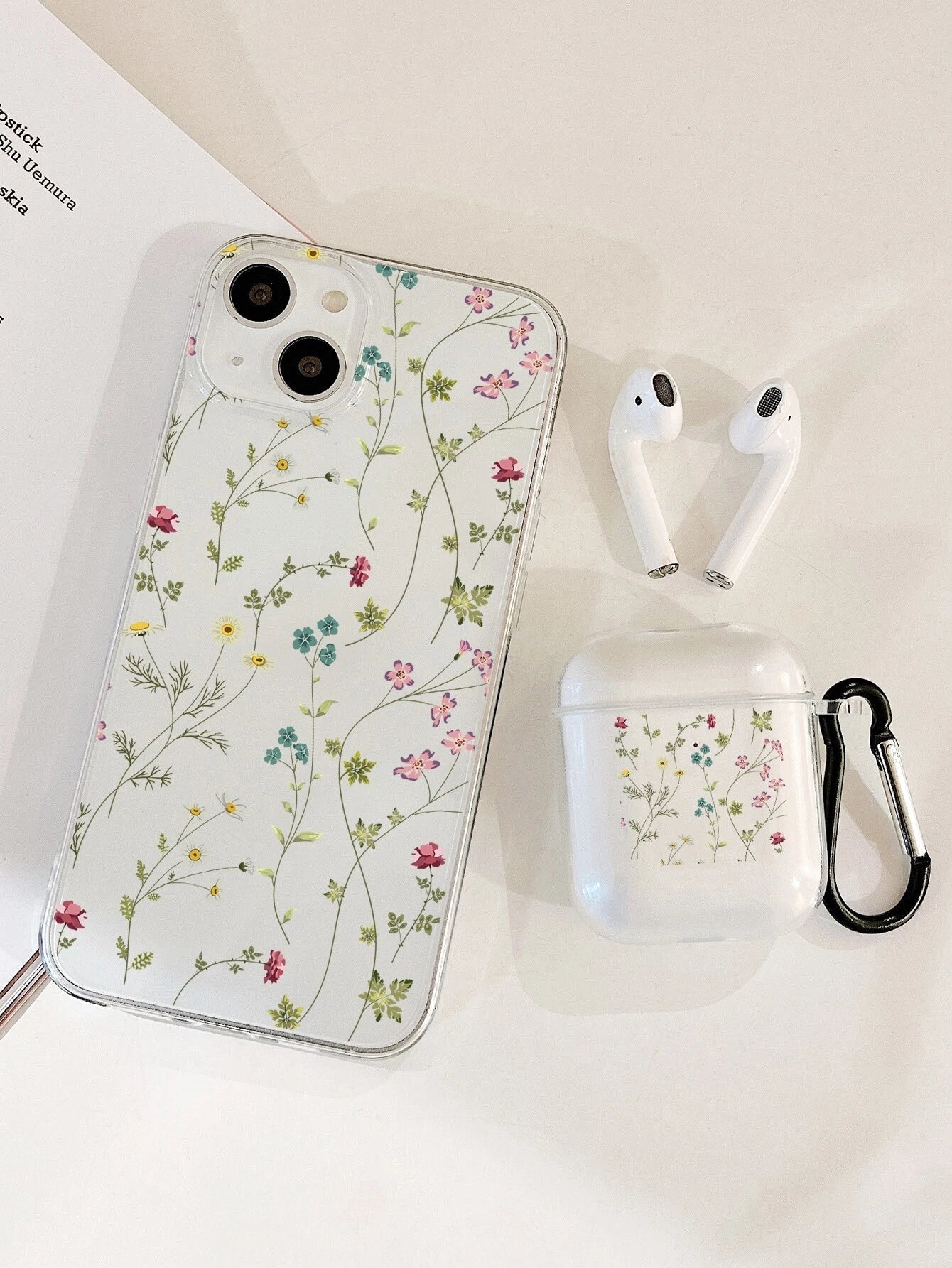 1 funda transparente con diseño floral y 1 funda compatible con Airpods