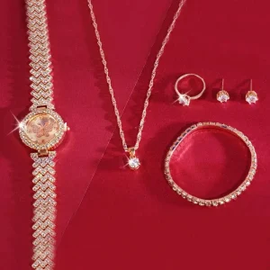 Conjunto original de 5 piezas de joyería está completamente incrustado con elementos brillantes