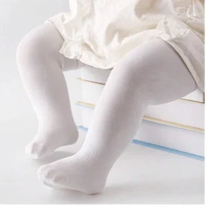 SHEIN Medias de terciopelo de color liso con alta elasticidad para niñas