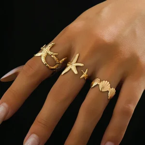 SHEIN Set de 3 anillos metálicos con tema oceánico